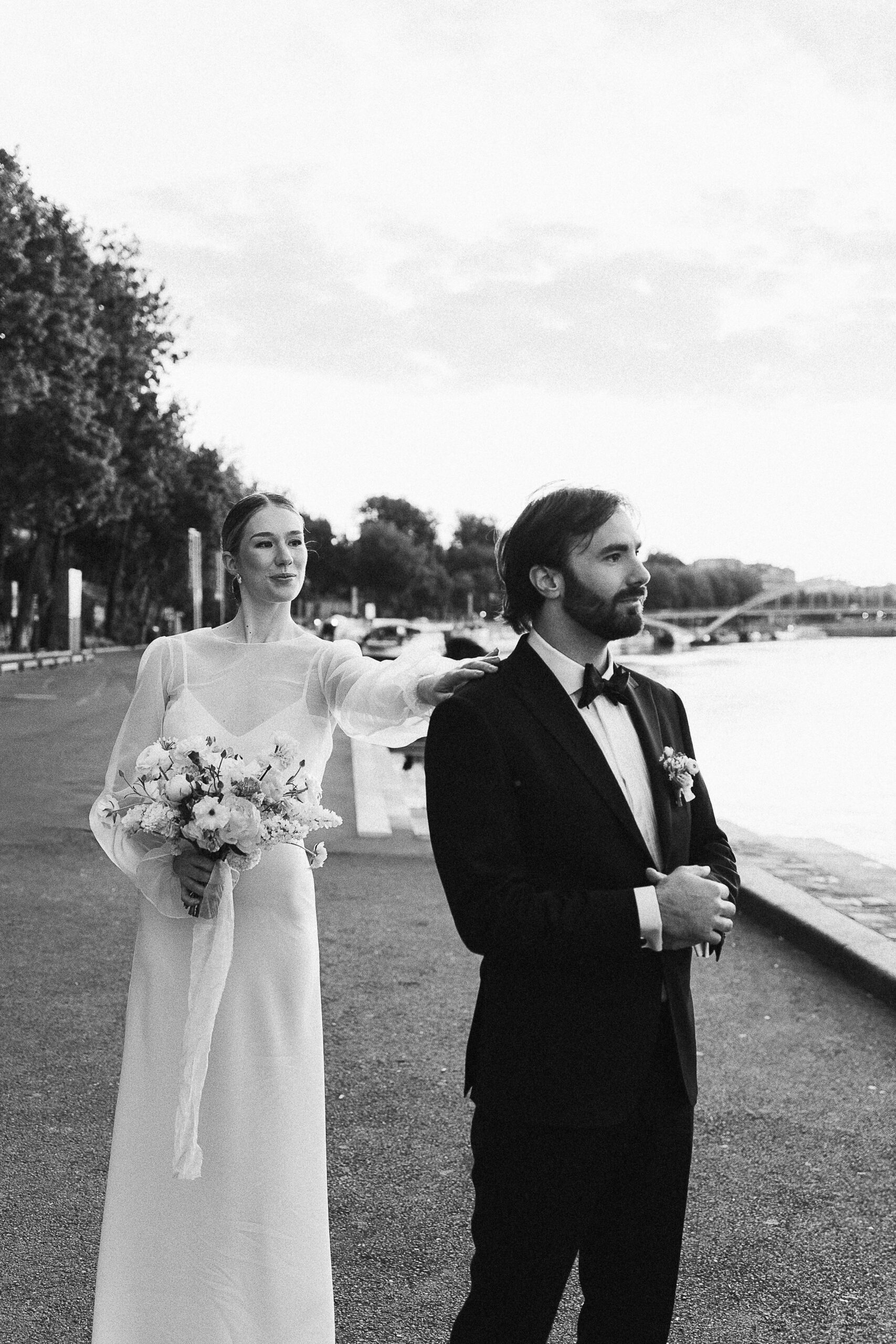 Loving couple exchanging vows at sunrise in front of the Eiffel Tower