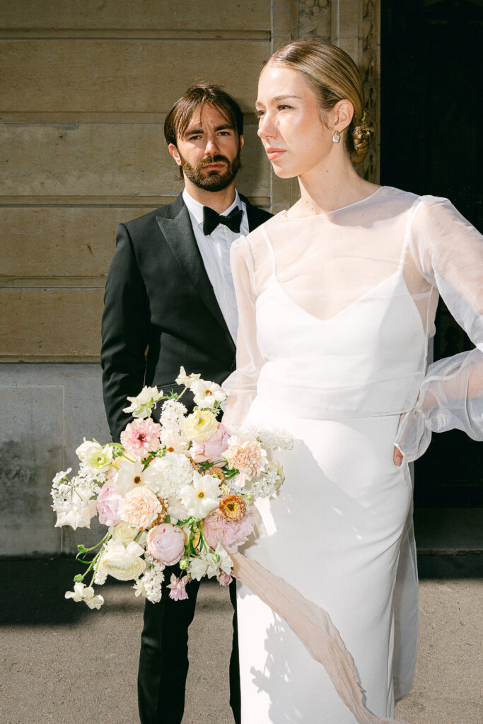 married-couple poses in fashion one Camoens Avenue
