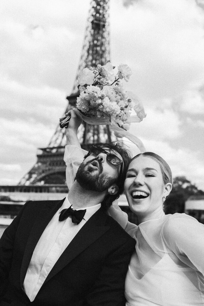 the bride and groom on a French Riviera-style boat on the Seine river in Paris