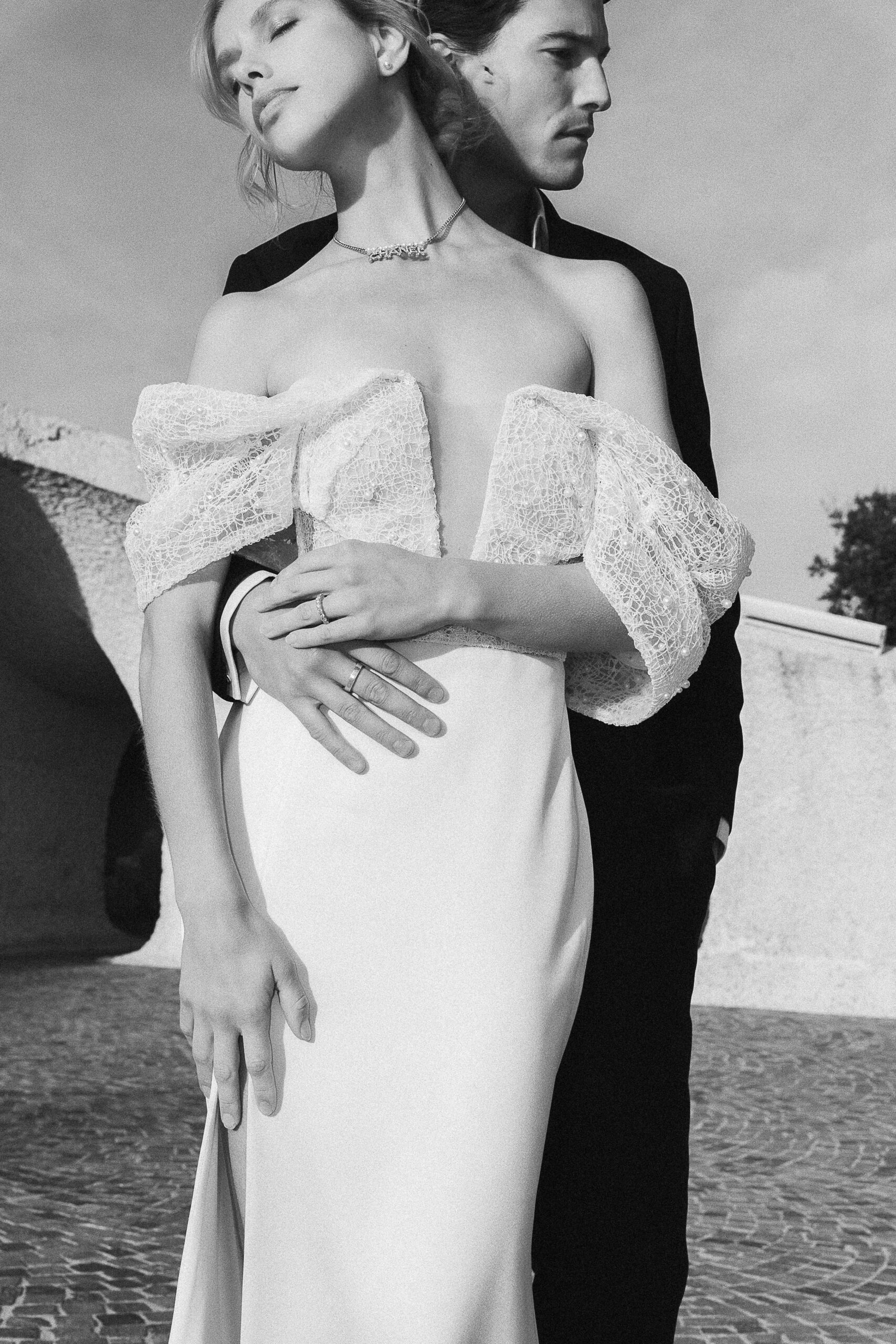 Elegant detail of a model couple during a fashion-inspired editorial shoot, photograph by Julie Chef Photography